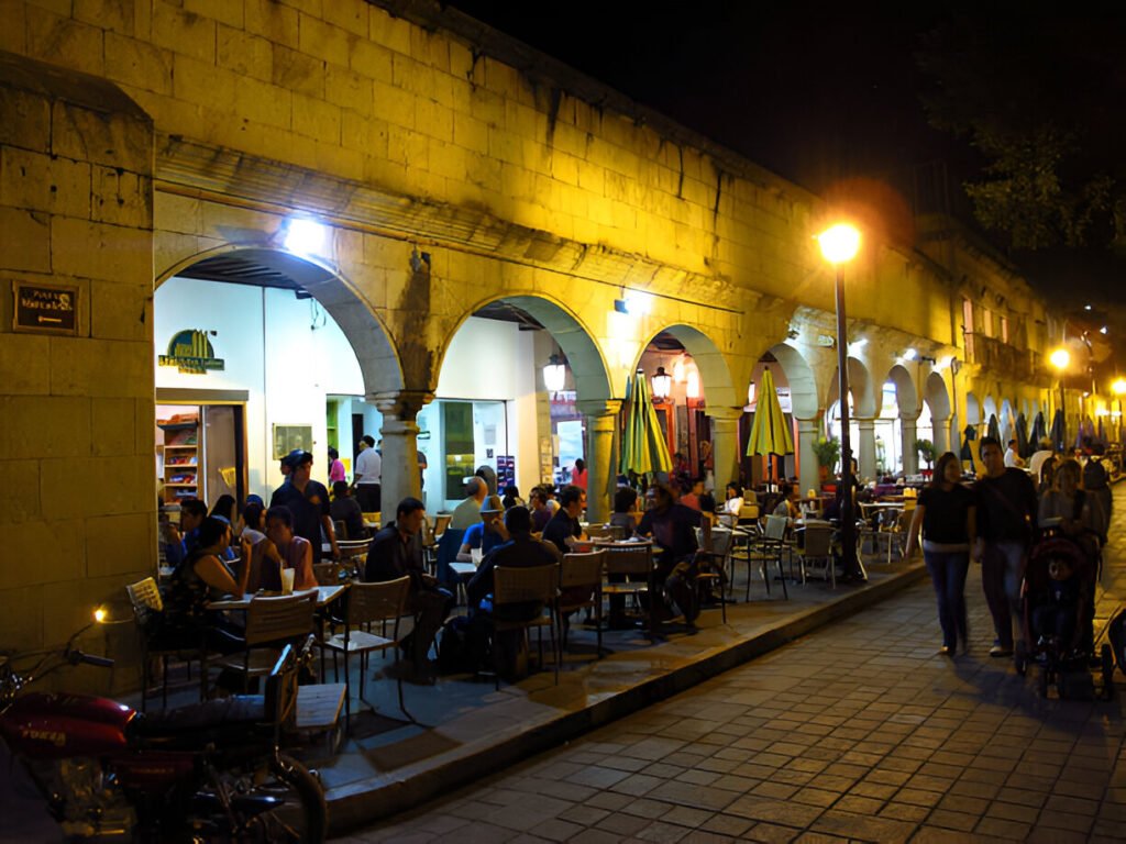 Where to eat in Oaxaca Mexico: Traditional market vendors selling authentic Oaxacan food and spices at Mercado 20 de Noviembre